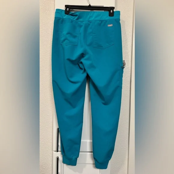 FIGS Teal Scrub Set — Catarina Top + Zamora Joggers (Small Stains) - Picture 7 of 9